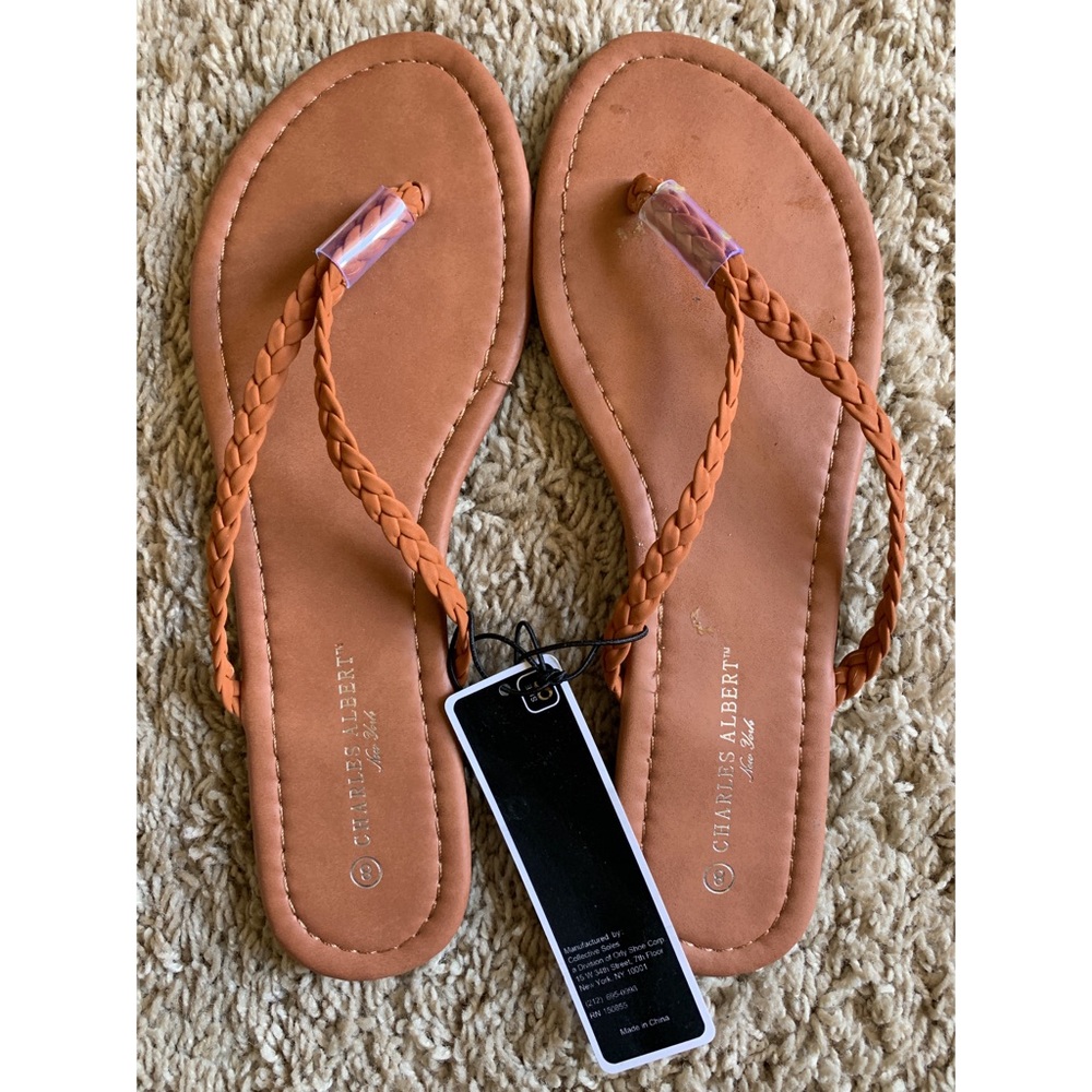 Size 8 tan flip flops
